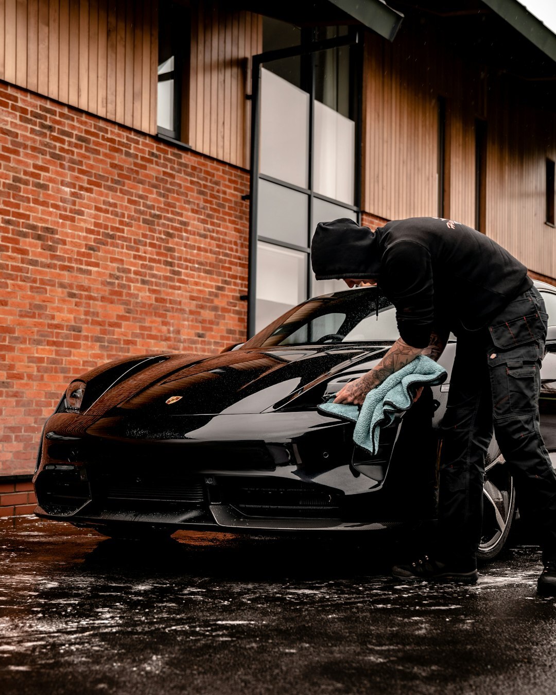car being washed with sponge