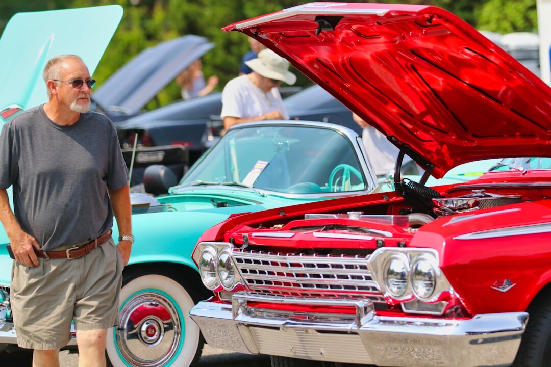 Classic car rally gathering on a coastal avenue in Punta del Este