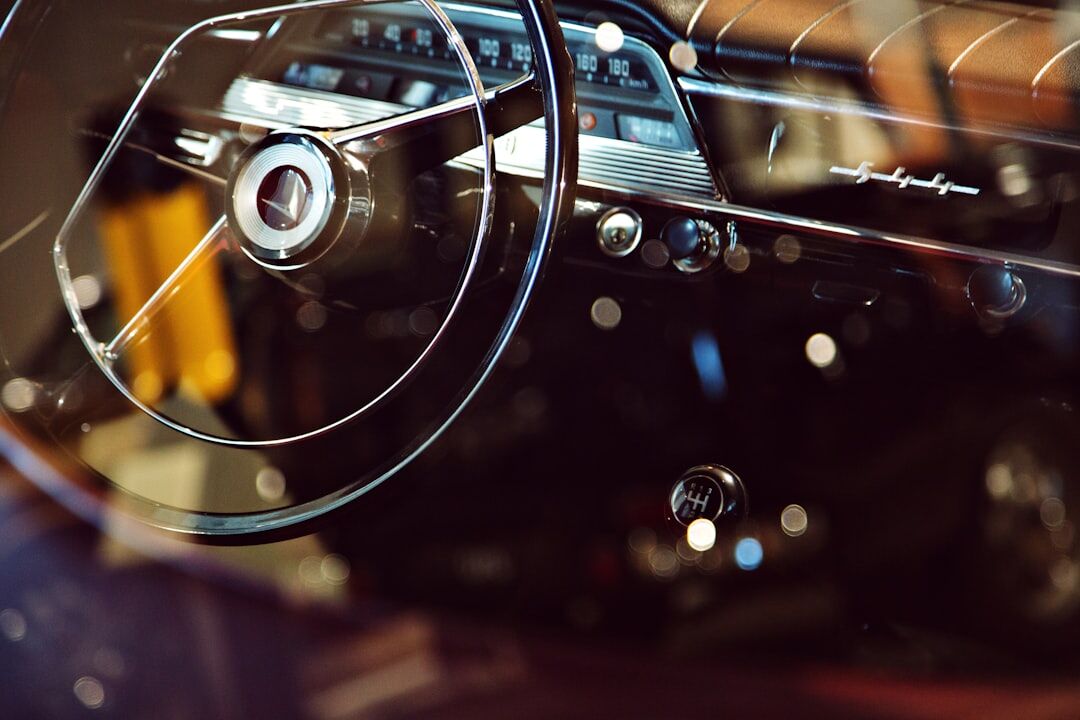 Virtual gallery style interior showcasing a rotating classic automobile