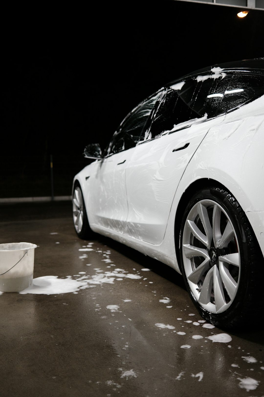 car being washed with sponge